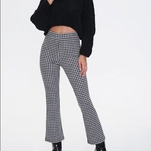 Black houndstooth cropped flare pants